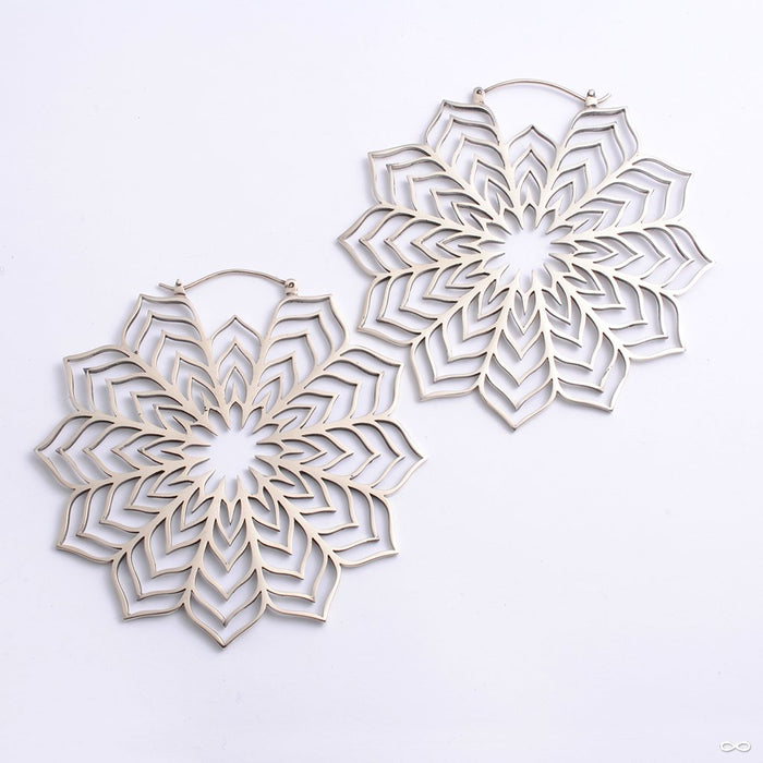 Houdini Earrings from Maya Jewelry in white brass