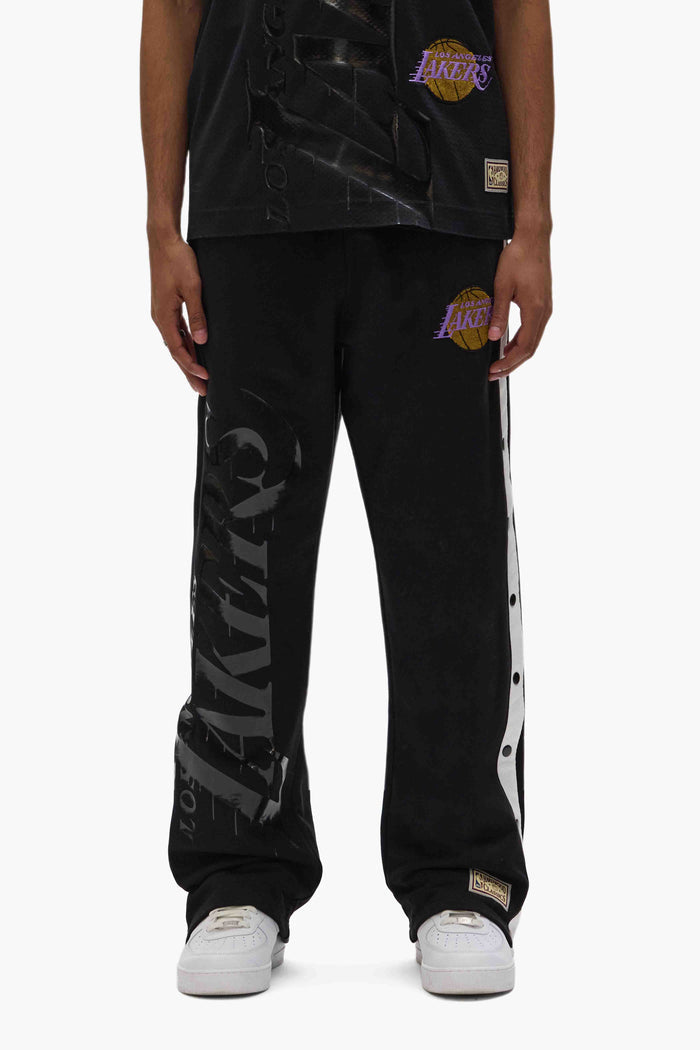 LA Lakers Snap Pants with snap buttons, elastic waistband, and adjustable drawstring.