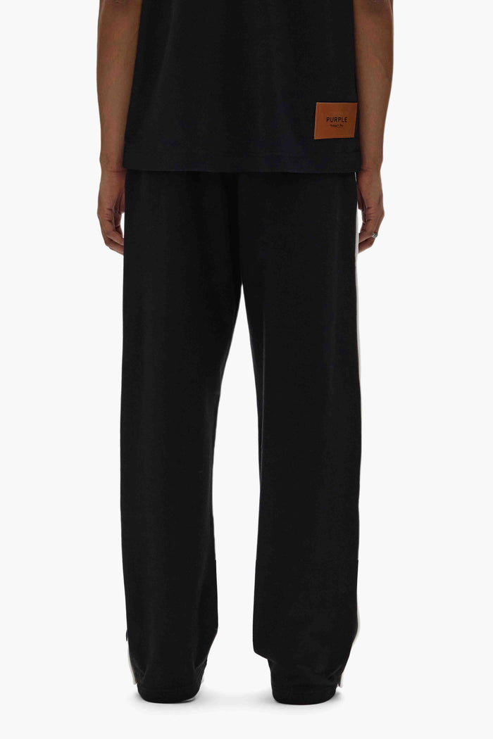 LA Lakers Snap Pants with snap buttons, elastic waistband, and embroidered details.