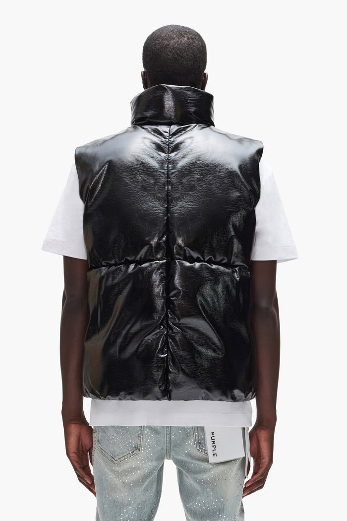 Leather Puffer Vest in oversized fit made of faux leather with duck down filling.