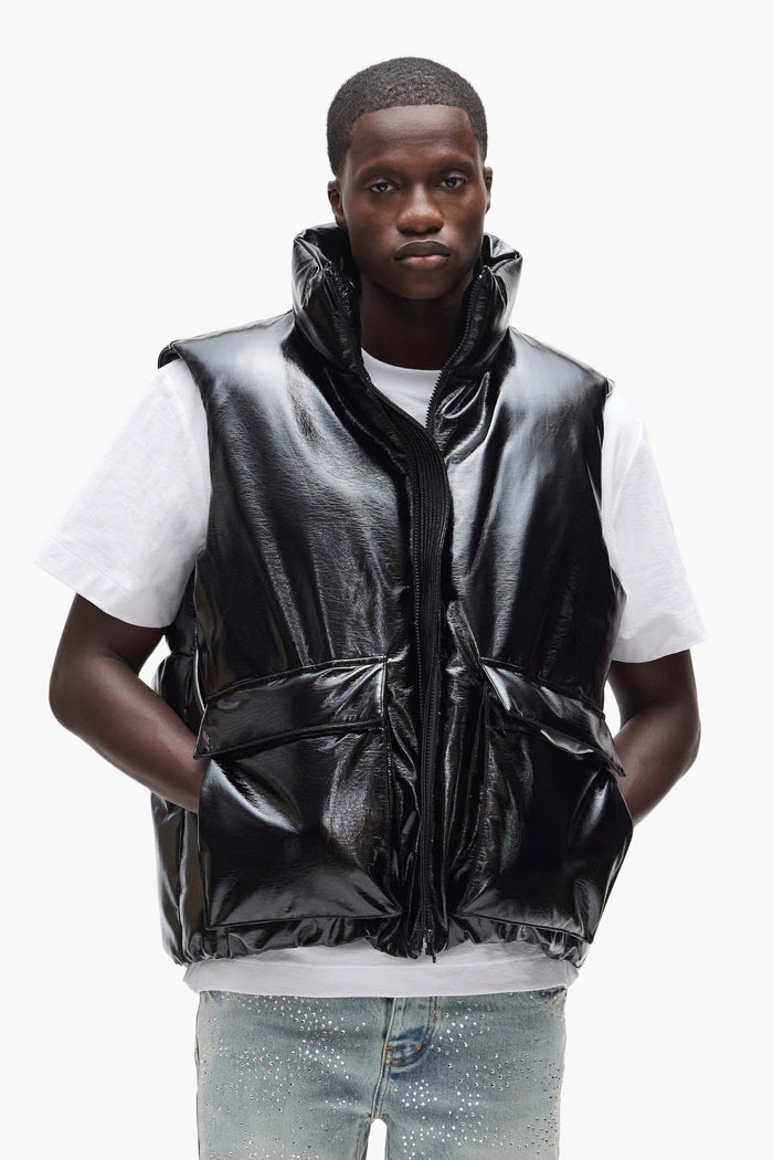 Leather Puffer Vest in oversized fit, made of faux leather with down and feather fill.