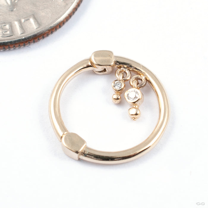 Liminality Dangle Clicker in Gold from Pupil Hall in yellow gold with diamonds in left orientation