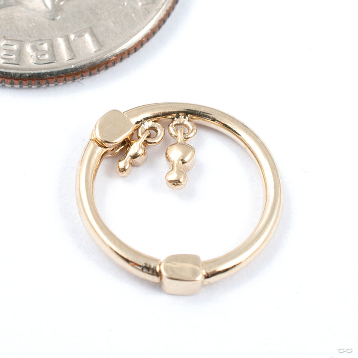Liminality Dangle Clicker in Gold from Pupil Hall in yellow gold right orientation back view