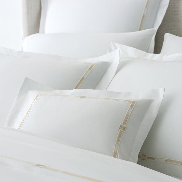 close up detail of the Lisetta embroidery pattern in the color Champagne