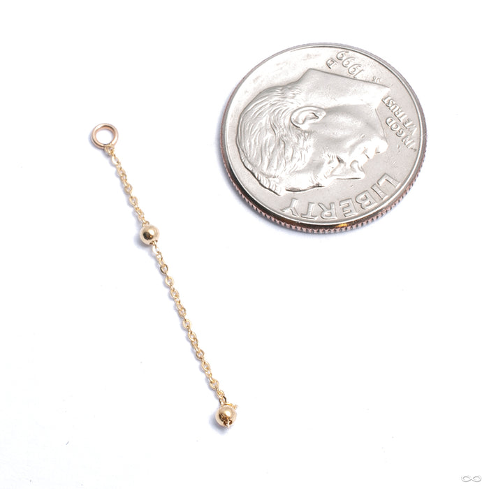 Long Kite Tail Charm with Beads in Gold from Quetzalli in yellow gold