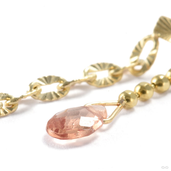 Lumen Press-fit End in Gold from Quetzalli with orange sapphire