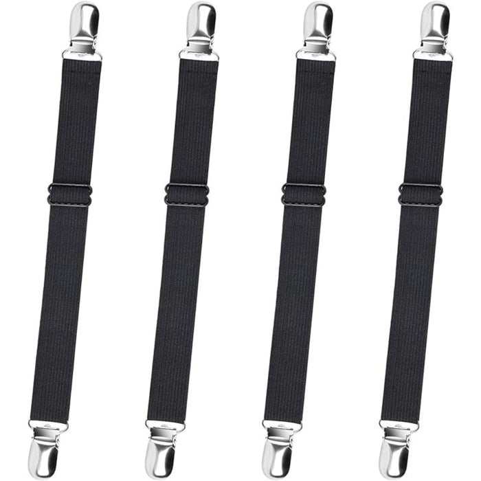Four black suspenders with silver clips on a white background