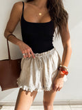 Maye Ruffle Shorts in Beige - Stitch And Feather