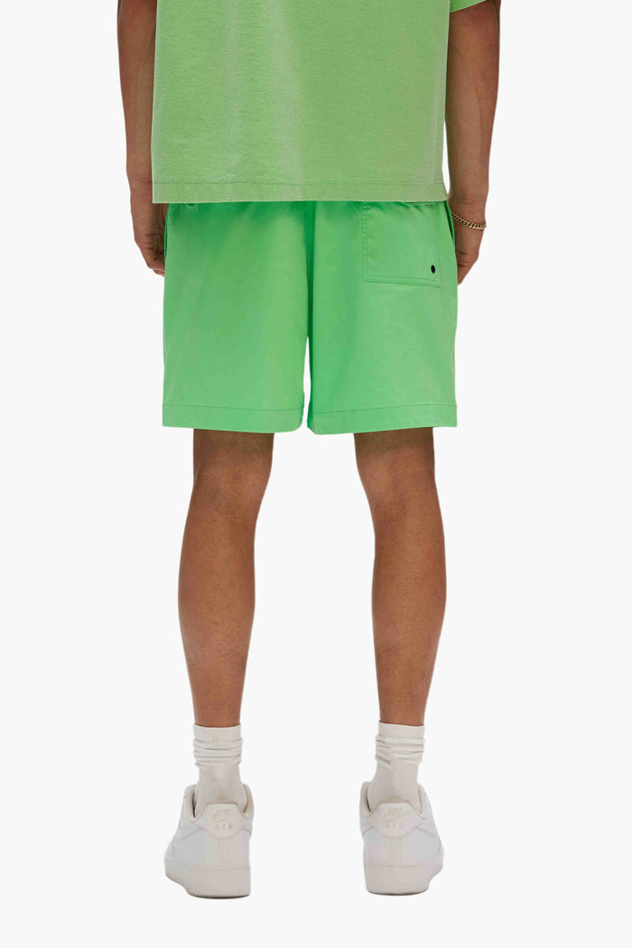 Metal Swim Shorts with pull-on waist and drawcords, featuring Purple Brand logo on left leg.