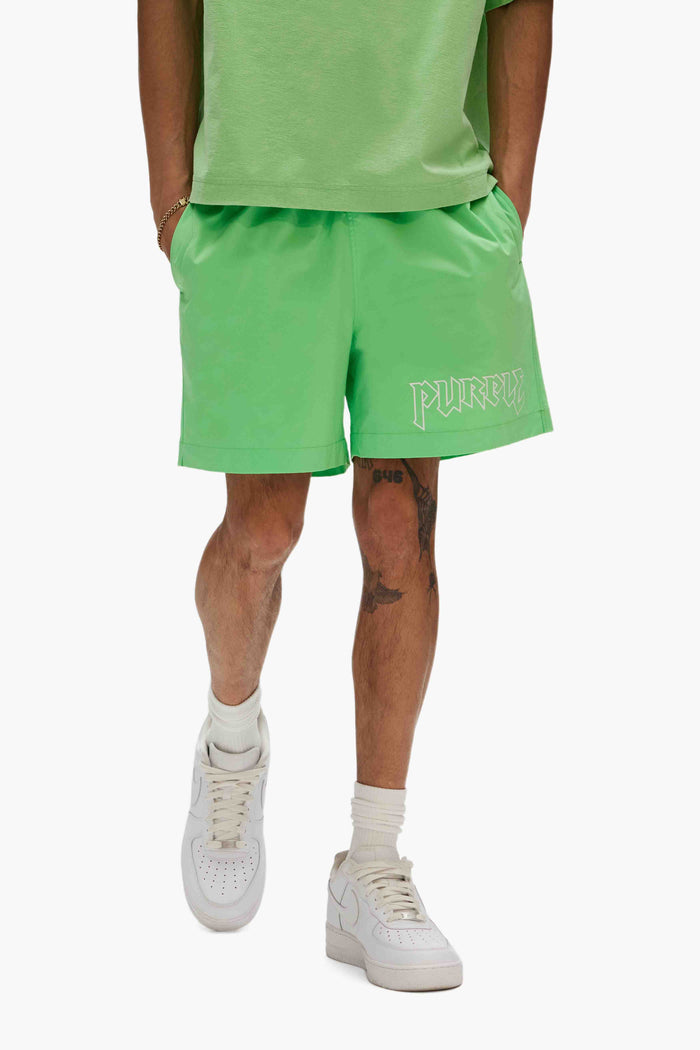 Metal Swim Shorts with silicone printed Purple Brand logo and pull-on waist, available in various sizes.