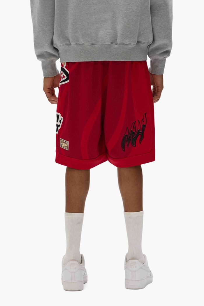 Miami Heat Mesh Shorts with elastic waistband and drawcords, featuring a relaxed fit.