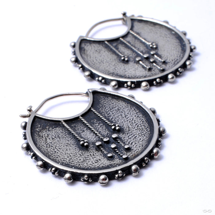 Moirai Earrings from Maya Jewelry in white brass