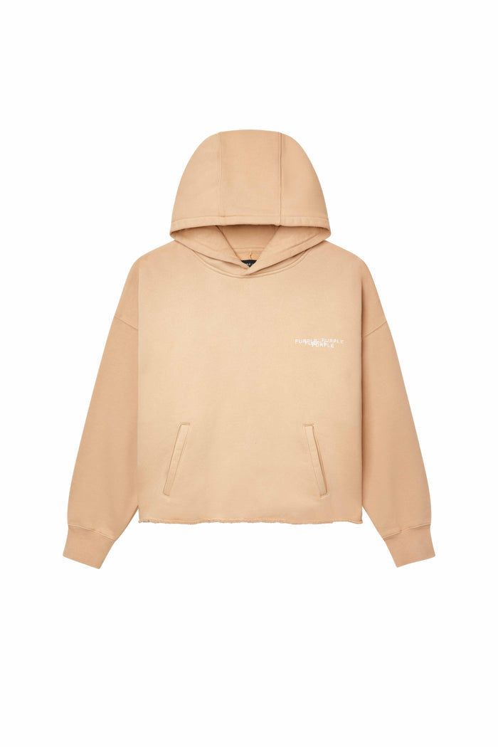 Newsprint Cropped Hoodie in ecru with Purple Brand logo and newsprint graphic on back