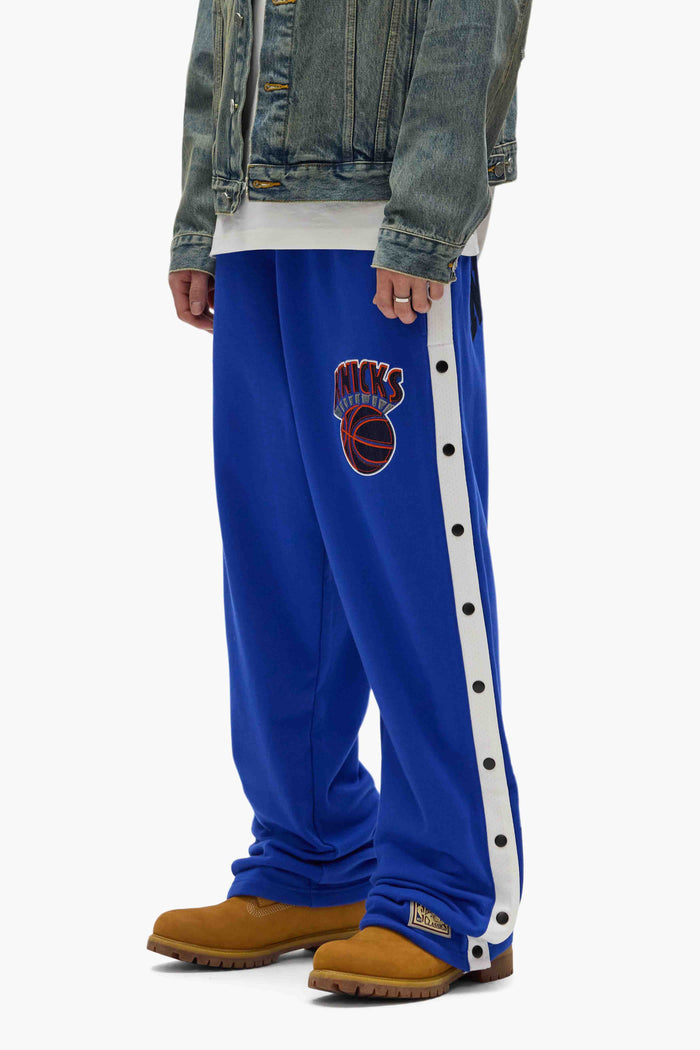 NY Knicks Snap Pants with snap buttons, elastic waistband, and embroidered graphics.