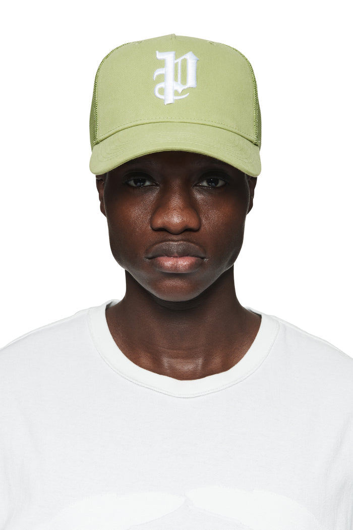 P Logo Trucker Hat green cotton twill with gothic Purple Brand monogram and curved visor.