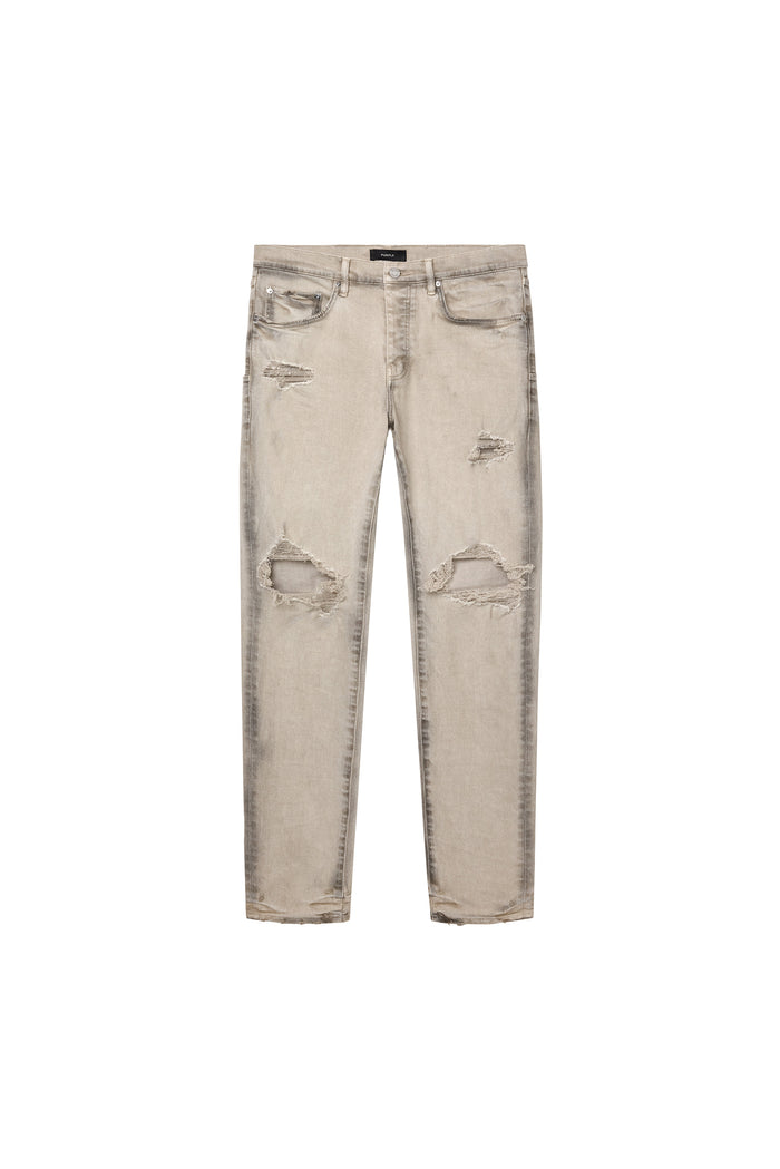 Tan skinny coated seam denim with front blowouts, available in sizes 28 to 40.