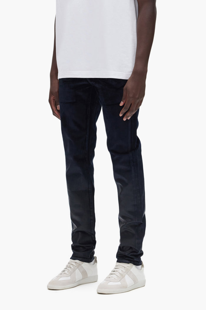 P001 Flock Dipped Denim in premium stretch fabric with low rise and coated design from knee down.