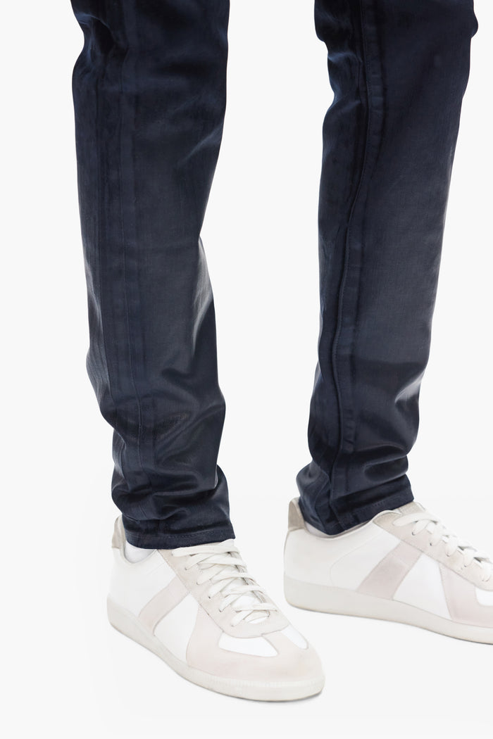 P001 Flock Dipped denim in navy with low rise and premium stretch features.