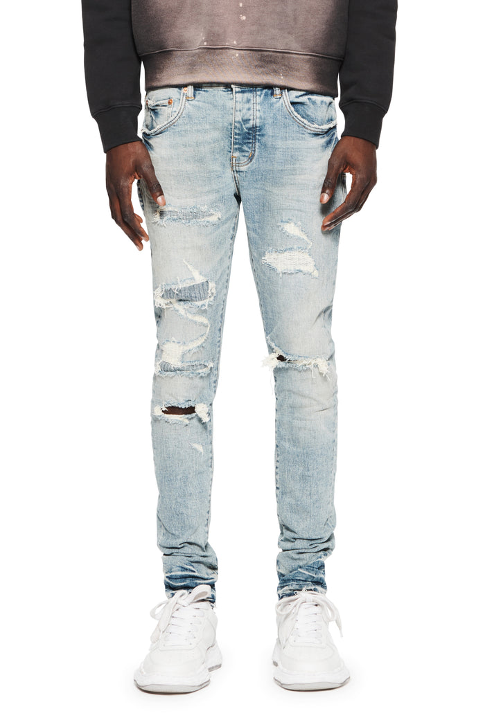 Mended Vintage Repair Denim in size 29 with heavy distressing and repairs.