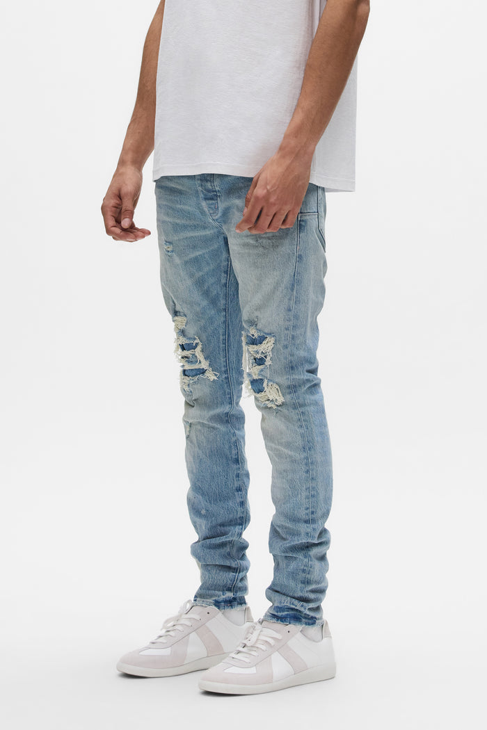 Stretch Skinny Denim with Bleach Detail and Front Blowouts in size variants 28-40