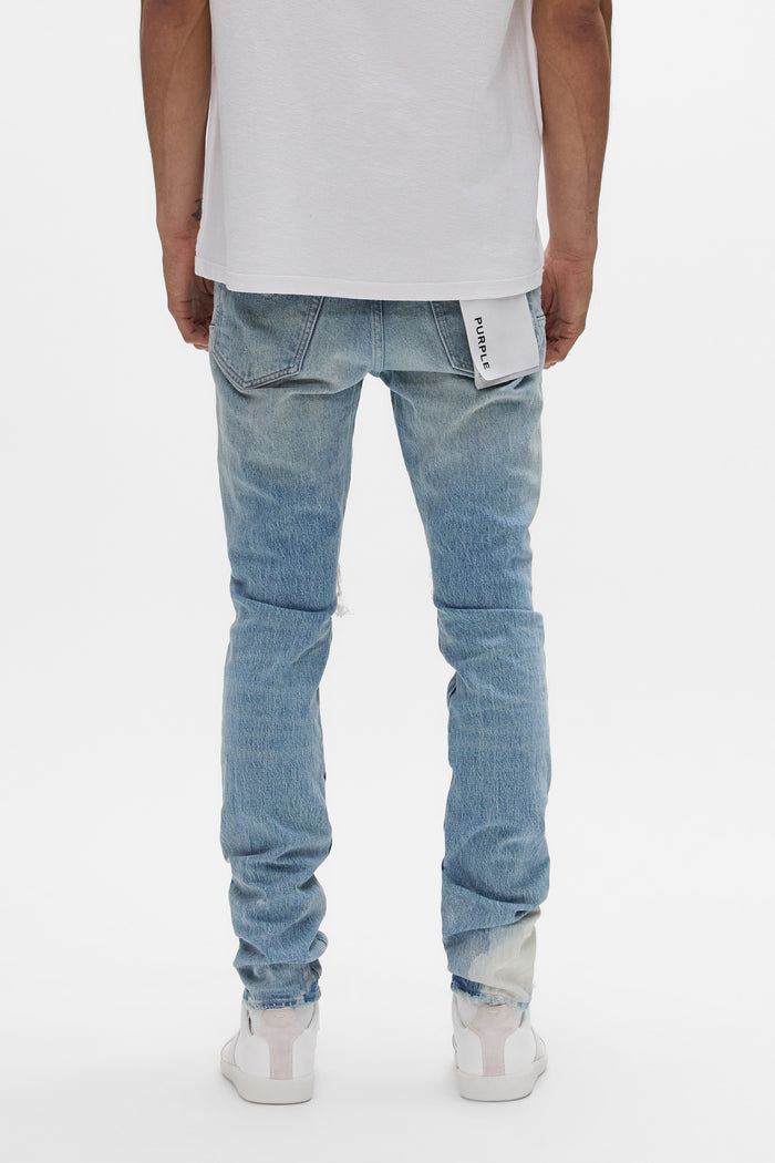 Stretch skinny denim P001 Repairs with bleach detail and front blowouts, sizes 28-40.