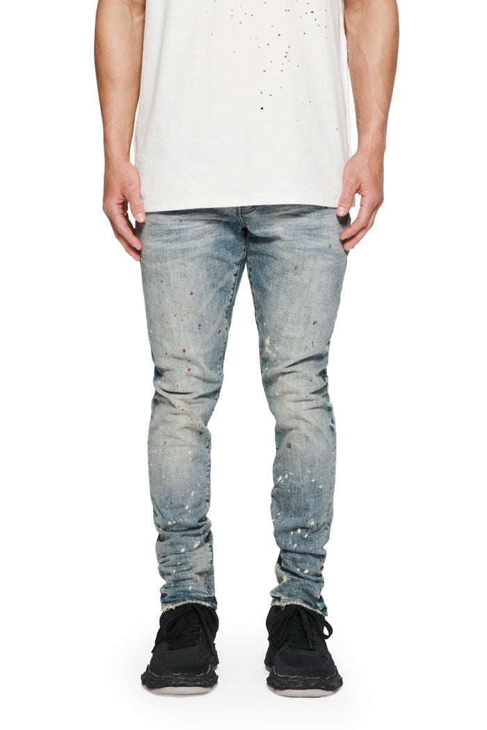 Faded Dappled Bleach Denim, Low Rise Stretch Skinny, size 28-40, features knee blowouts and paint spots.