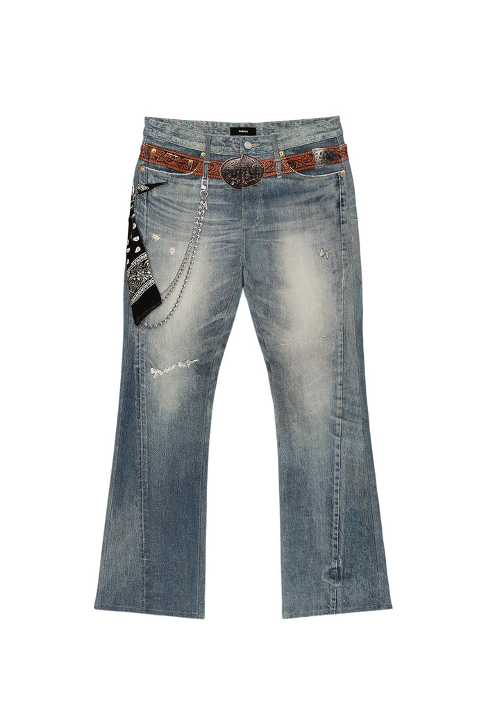 Digital print denim with low rise, slim fit, flared leg, and unique embellishments.