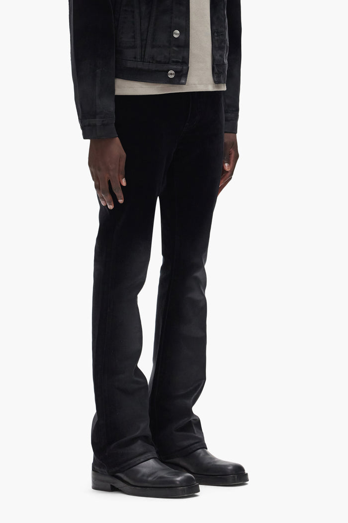P004 Flock Dipped premium stretch denim in assorted sizes with low-rise and coated finish.