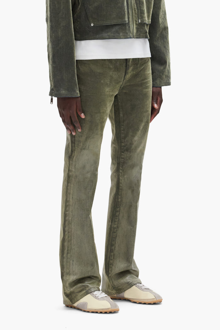 Flock Dipped denim, low rise slim fit with flared leg, available in sizes 28 to 40.