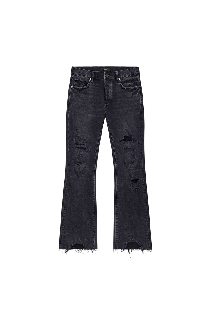 Vintage Heavy Destroy Denim in Black, Low Rise Slim Fit with Flared Leg and Sharkbite Hem.