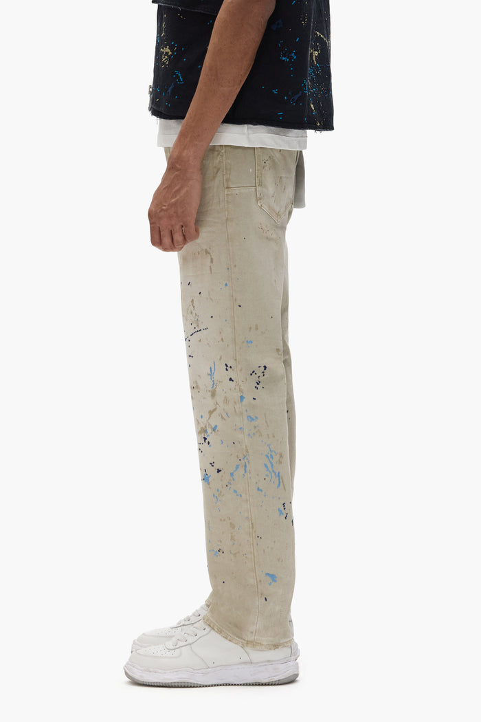P011 Double Paint Embroidery mid-rise denim jeans with khaki wash and paint-splatter details.