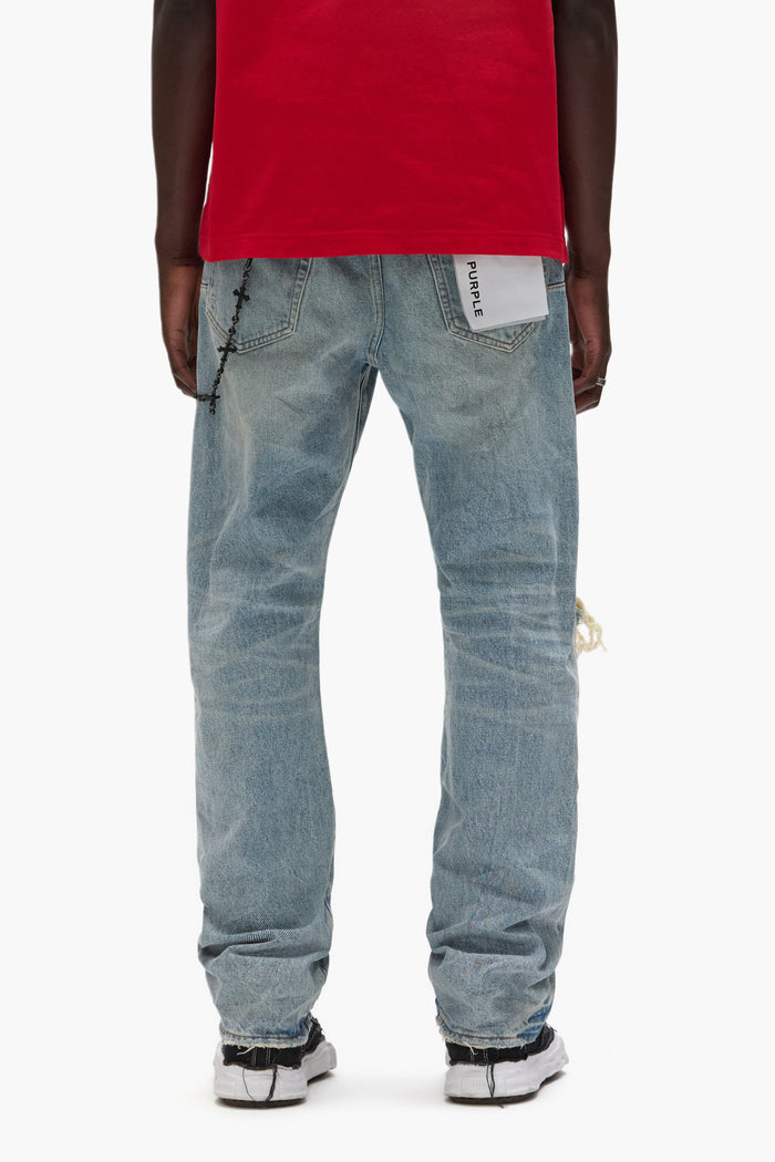 P011 Knee Blowout mid-rise men's denim jeans in dirty light indigo with large knee tear.