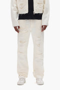 P011 Patch Blowout mid-rise straight leg denim with repairs and sequins in various sizes.