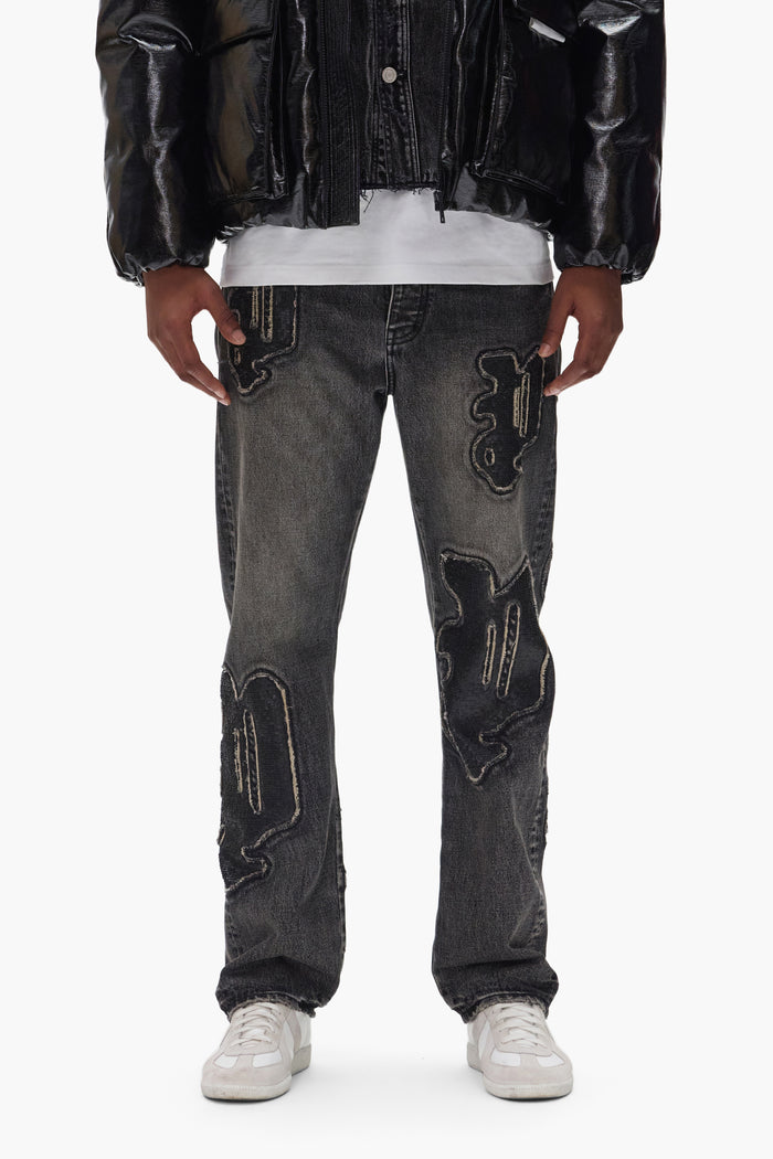 P011 Sequin Logo straight leg denim with purple sequin logo, available in various sizes.