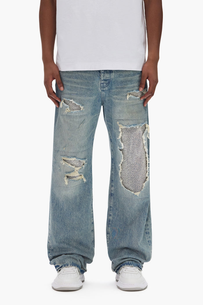 Beaded Repair Denim in various sizes including 28-40 with unique handcrafted details.