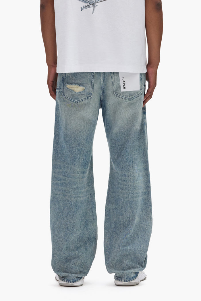 Beaded Repair Mid Rise Denim with back pockets and beaded patches in size 28 to 40.