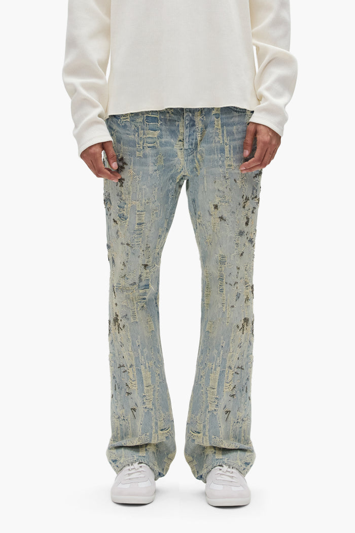 Bootcut denim P026 Bead Splatter Destroy with mid rise and beaded embellishments.