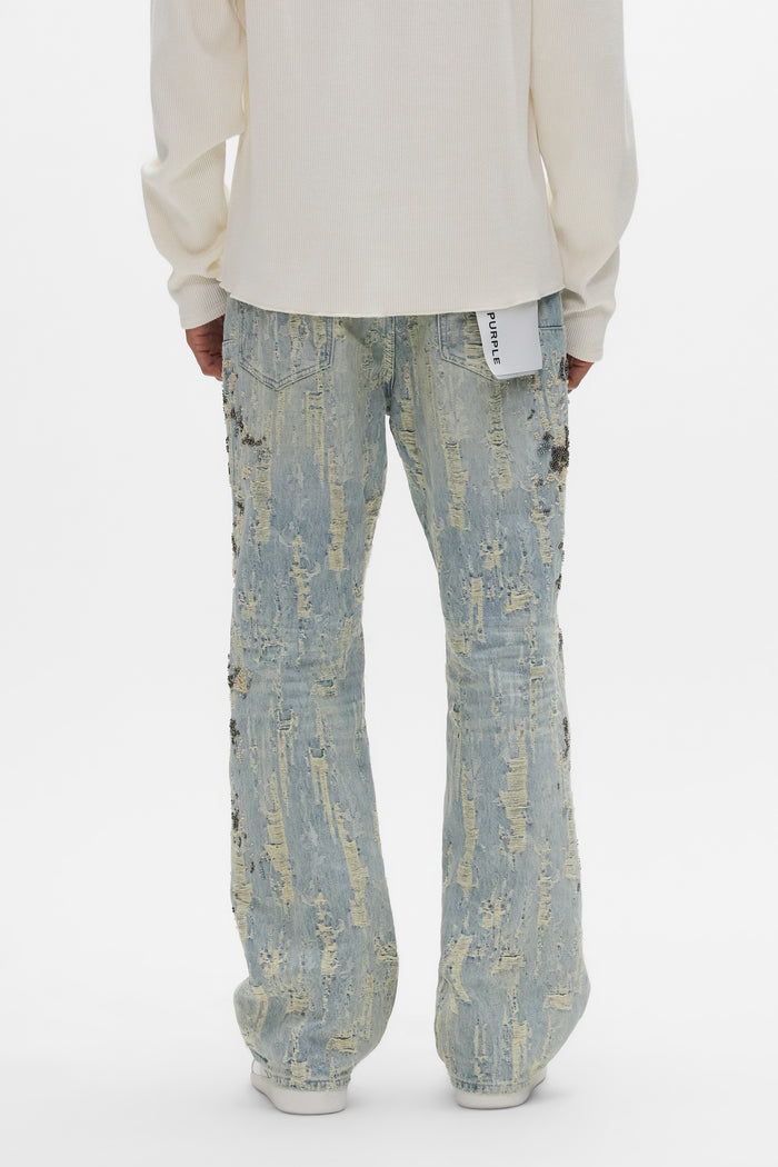 P026 Bead Splatter Destroy bootcut denim jeans with beaded embellishments and all over destroy detail.
