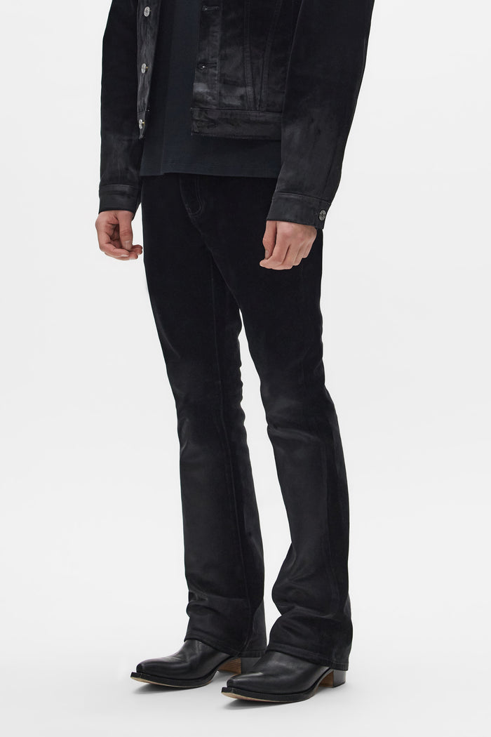 Flock Dipped Denim in various sizes, featuring mid-rise bootcut design and coated finish.