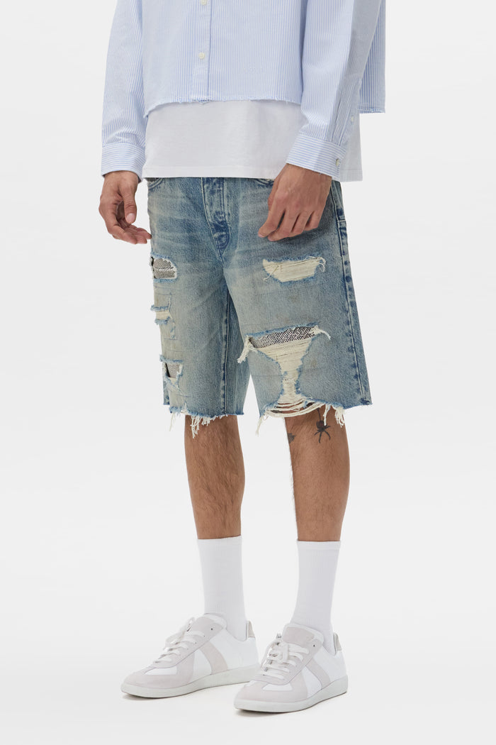Beaded Destroyed Short with raw edge hem, relaxed fit, and rips, available in sizes 28-40.