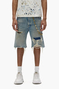P059 Distressed Patch Shorts in light indigo wash with frayed hems and button-fly closure.