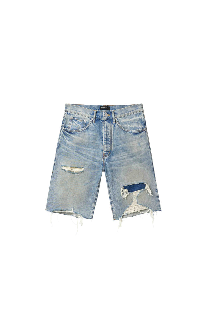 P059 Distressed Patch Shorts in light indigo wash with frayed hems and five-pocket construction