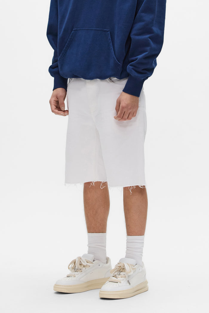 P059 Optic Short in white, 100% cotton, relaxed fit, featuring 5 pocket styling and raw cut-off hem.