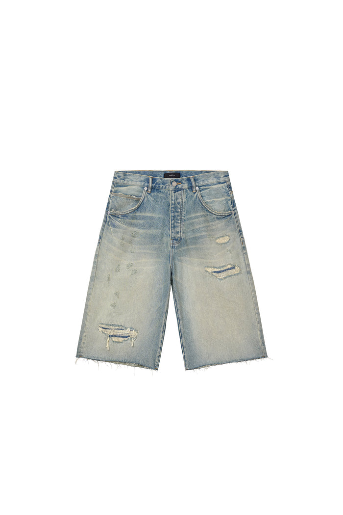 Shorts P070 Antique Tinted with destroyed hem and wide leg design in light indigo.