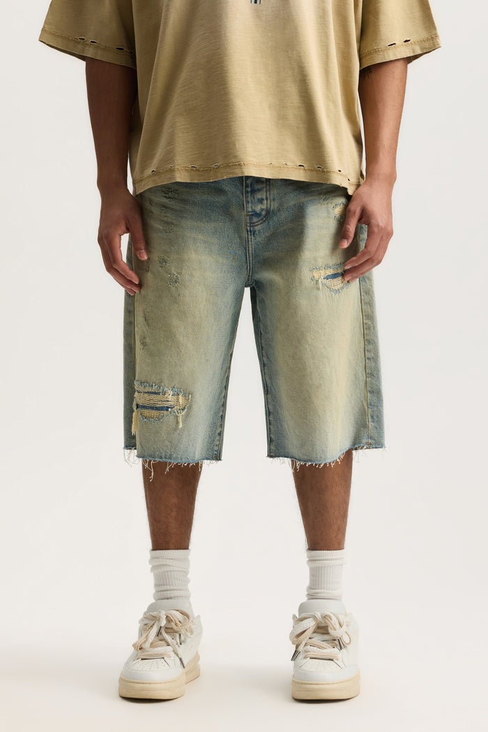 P070 Antique Tinted shorts, wide leg style with destroyed hem and 5 pocket styling.