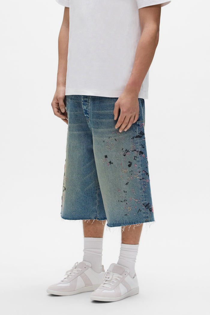 Beaded Splatter Short with wide leg, reinforced belt loops, and button fly in various sizes.