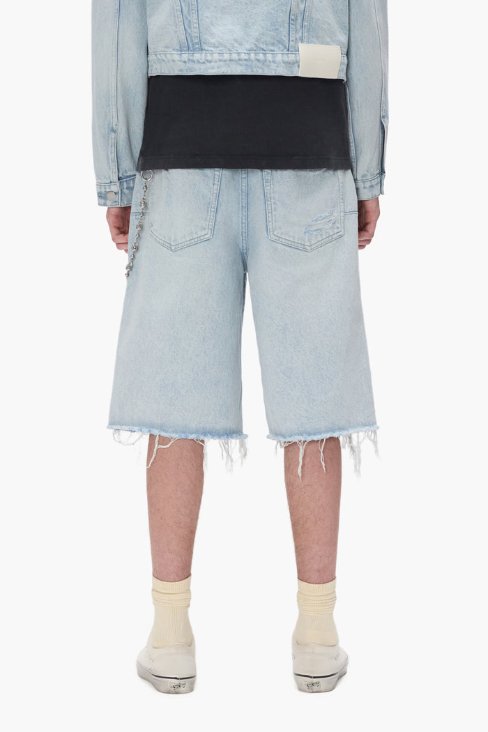 Blowout Patched Short with raw cut hem, wide leg, and reinforced belt loops, available in sizes 28-40.