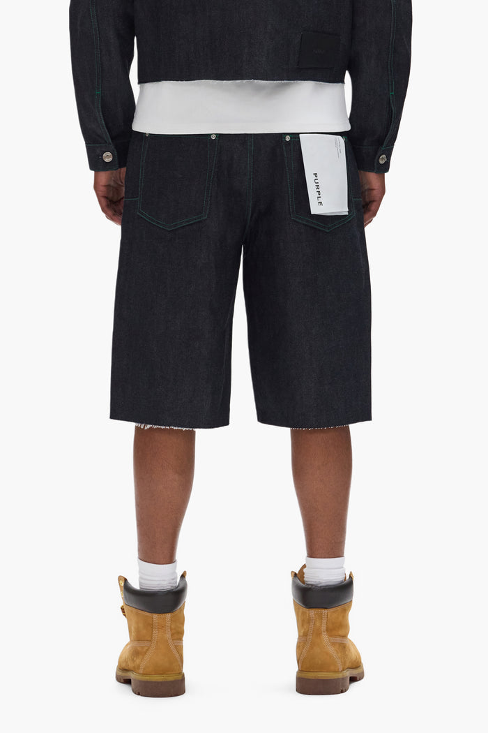 P070 Raw Shorts in Clean Dark Indigo with a raw cut hem and wide leg design.