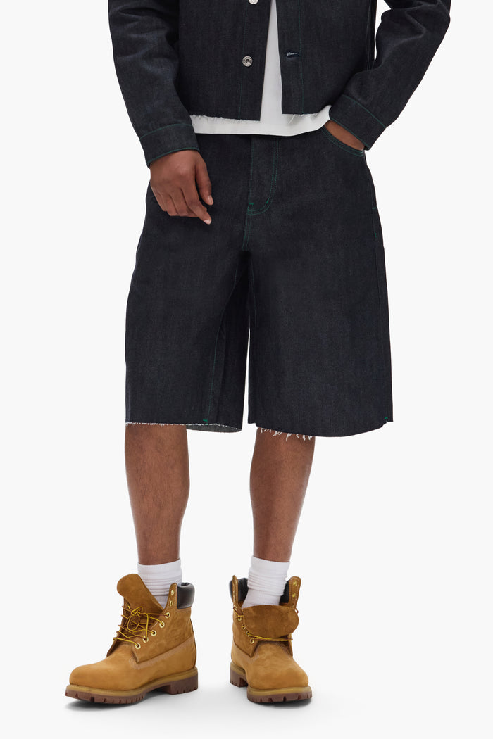 P070 Raw Shorts, wide leg, clean dark indigo, 5 pocket styling, raw cut hem, sizes 28-40.