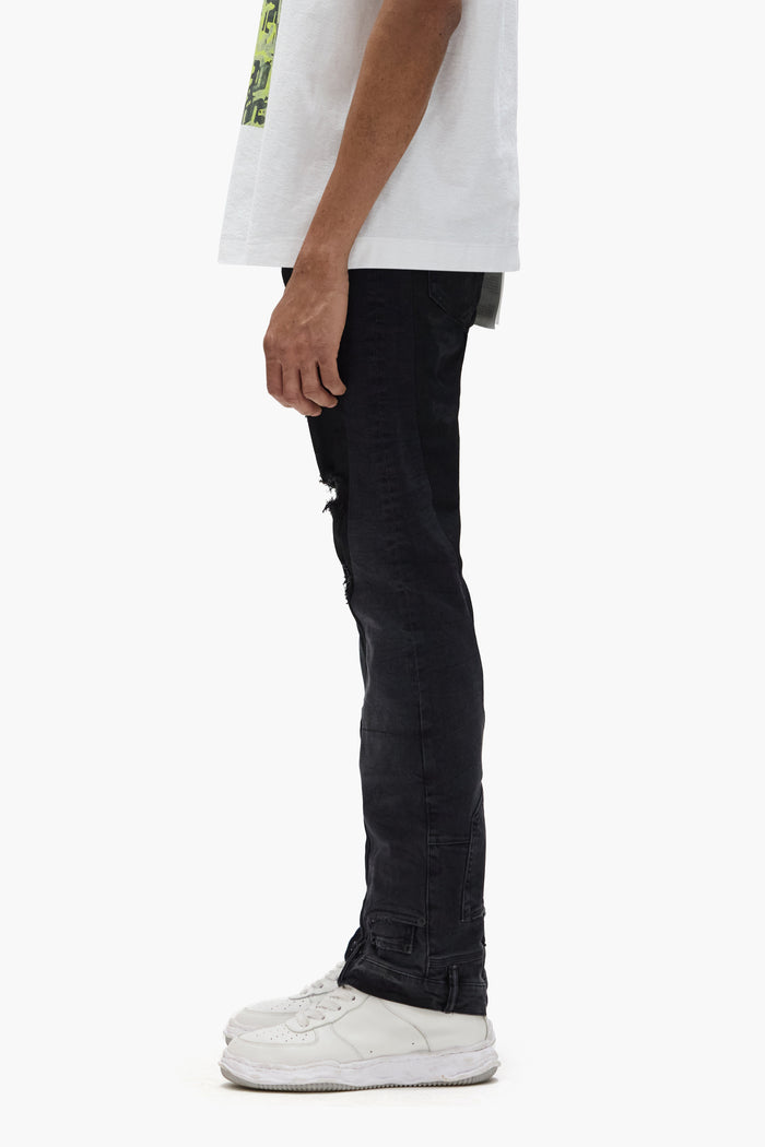 P094 Upside Down Flare men's jeans in black wash with inverted side panels and flared hem.